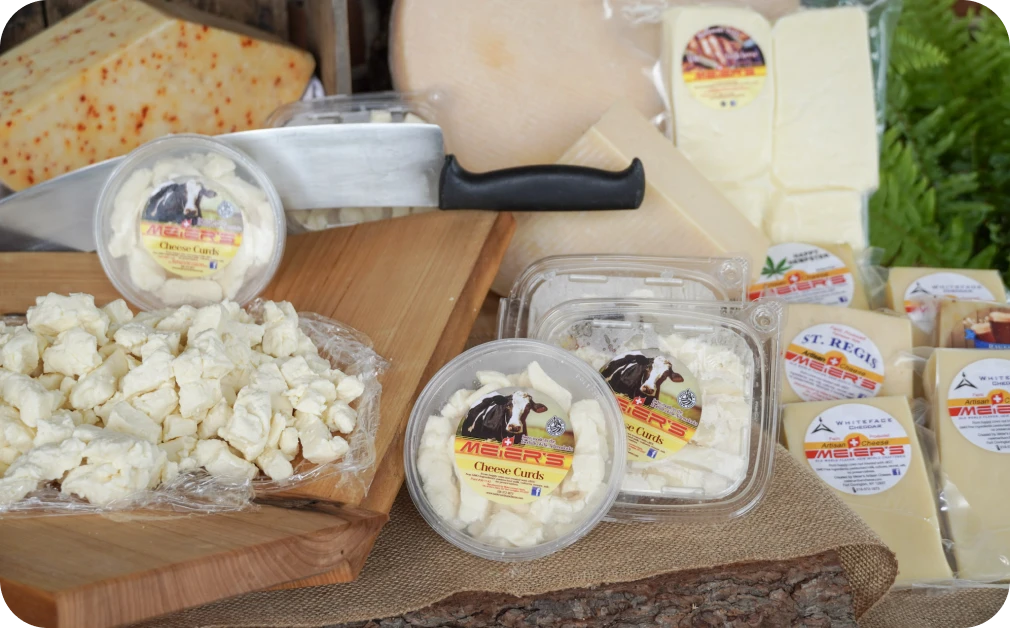 Variety of cheeses with knife and board